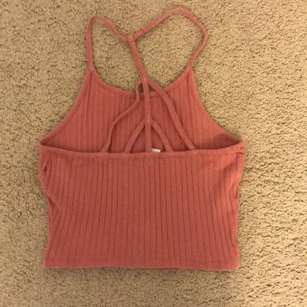 Cute pink tank top with back detailing!